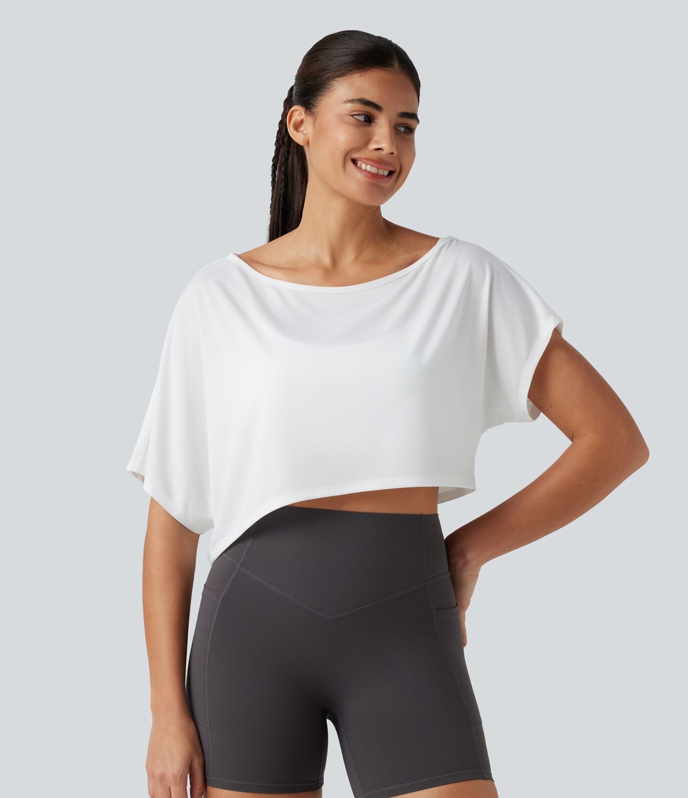 Haut de yoga court à une épaule, manches courtes, brassière intégrée, séchage rapide