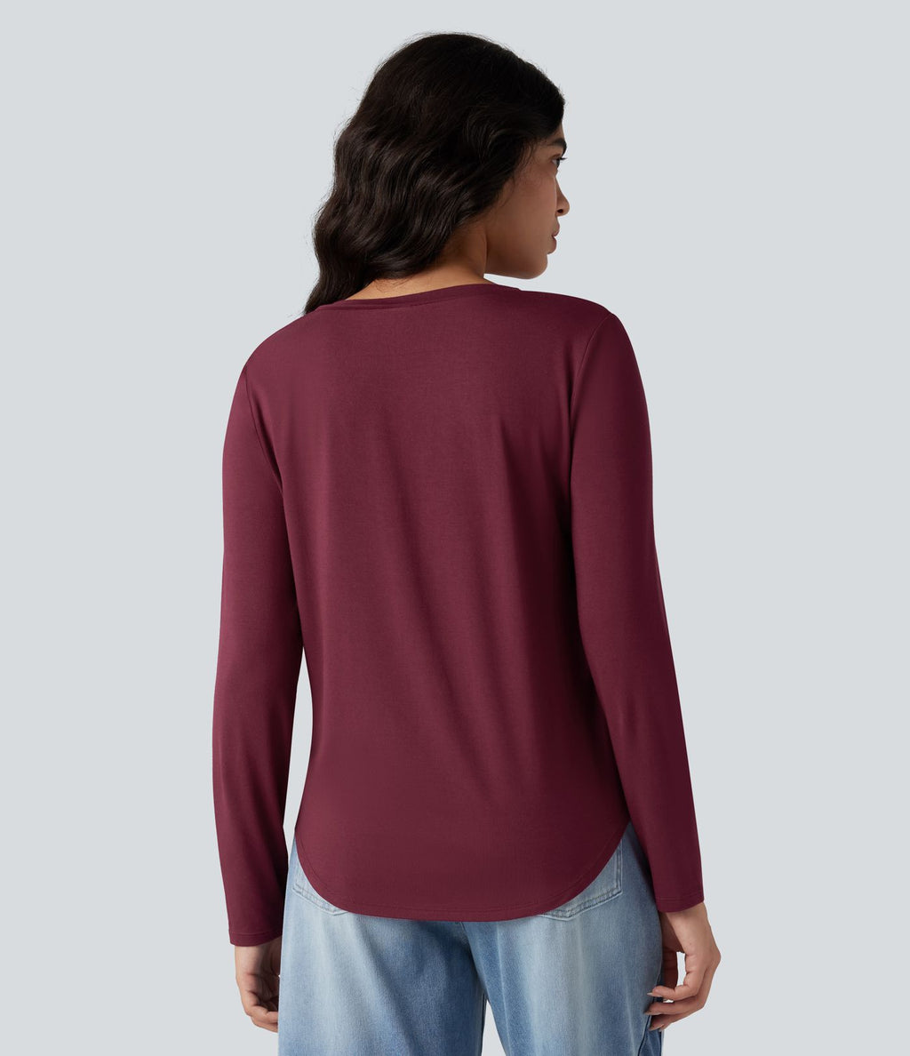 T-shirt col V manches longues ourlet arrondi coupe décontractée avec poche