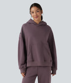 Sweat-shirt de sport casual oversize en molleton à capuche et manches longues avec poches