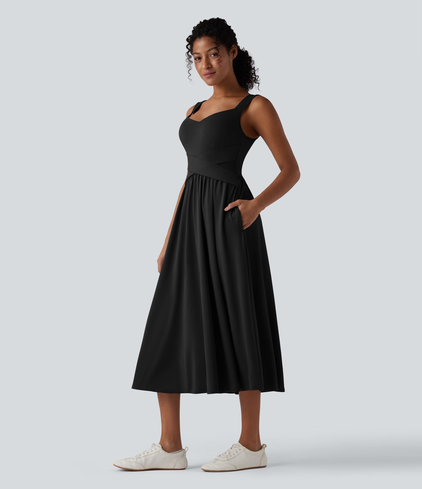 Robe midi fluide sans manches dos croisé ouvert avec poches