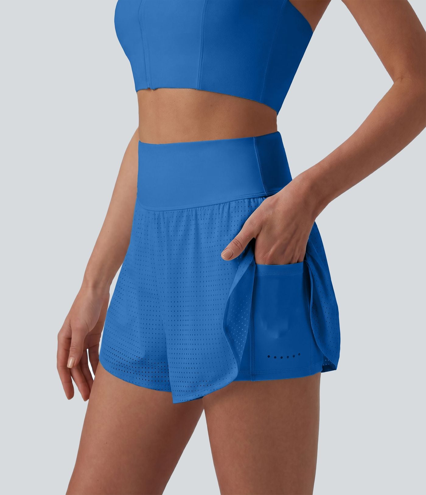 Short yoga 2-en-1 gainant taille haute à pois réfléchissants, ourlet arrondi croisé et œillets avec poches