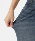 Jean baggy Halara Flex™ taille basse délavé asymétrique avec poches