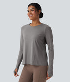 Haut de sport yoga dos nu manches longues avec trous pouces