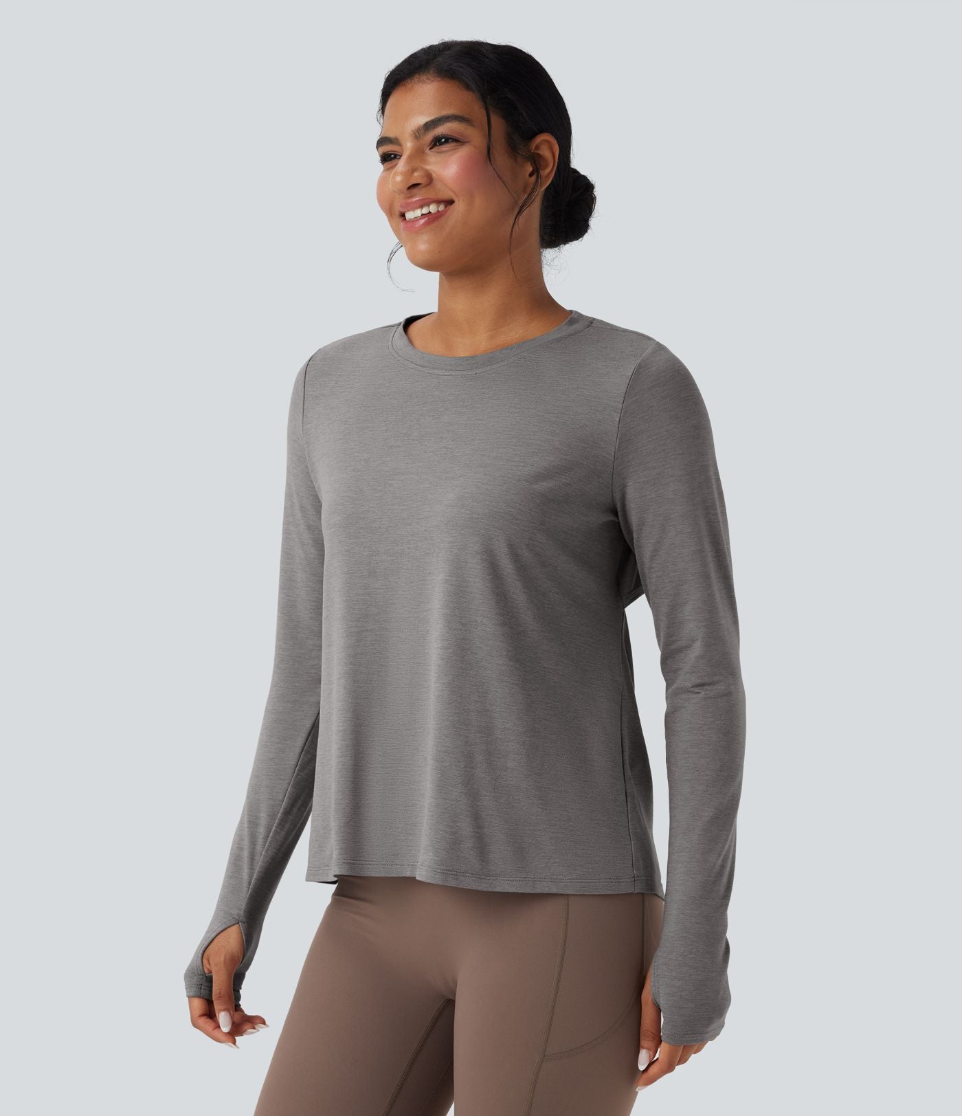 Haut de sport yoga dos nu manches longues avec trous pouces