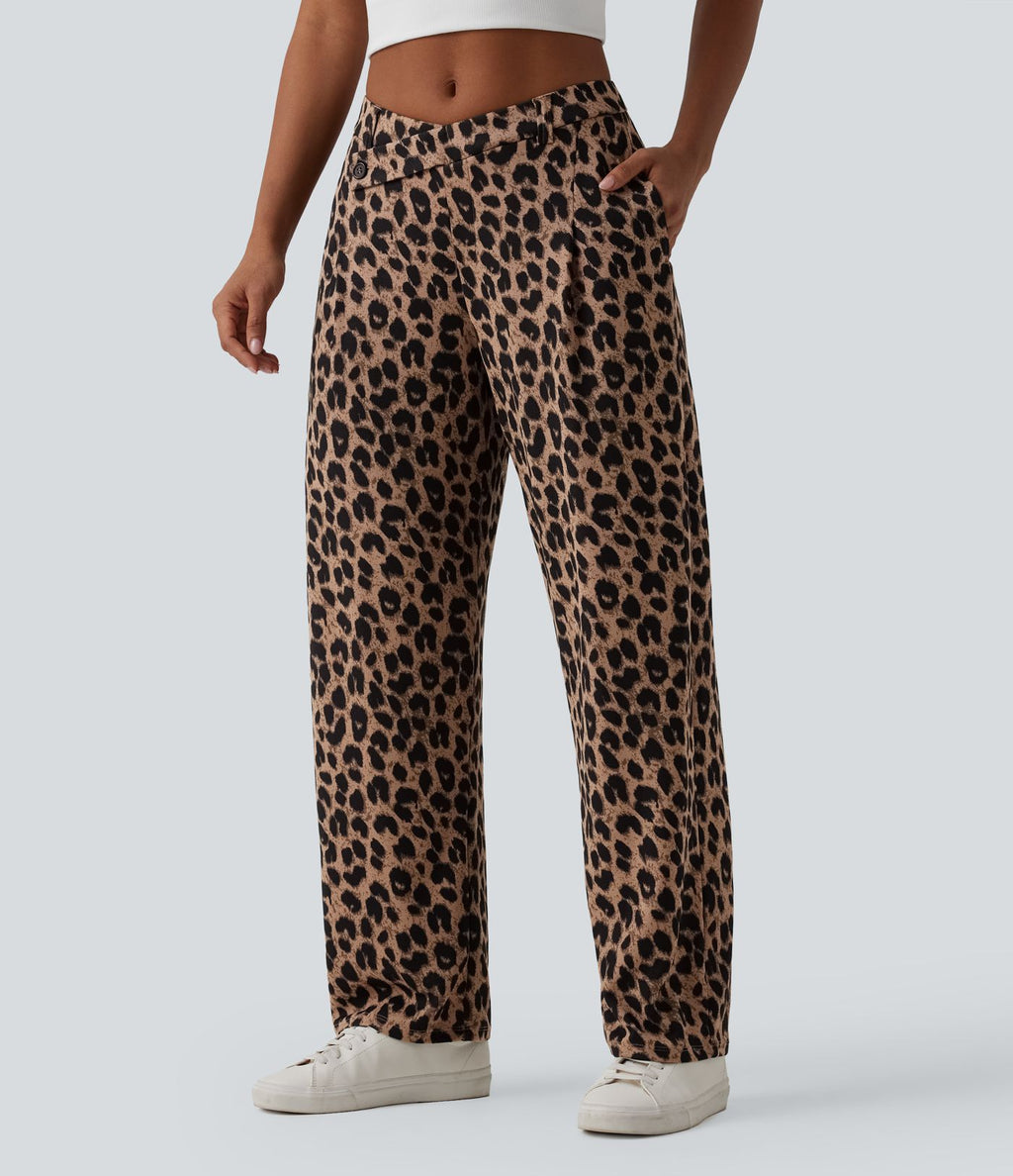 Pantalon tailleur fuselé asymétrique taille mi-haute gaufré imprimé léopard avec poches
