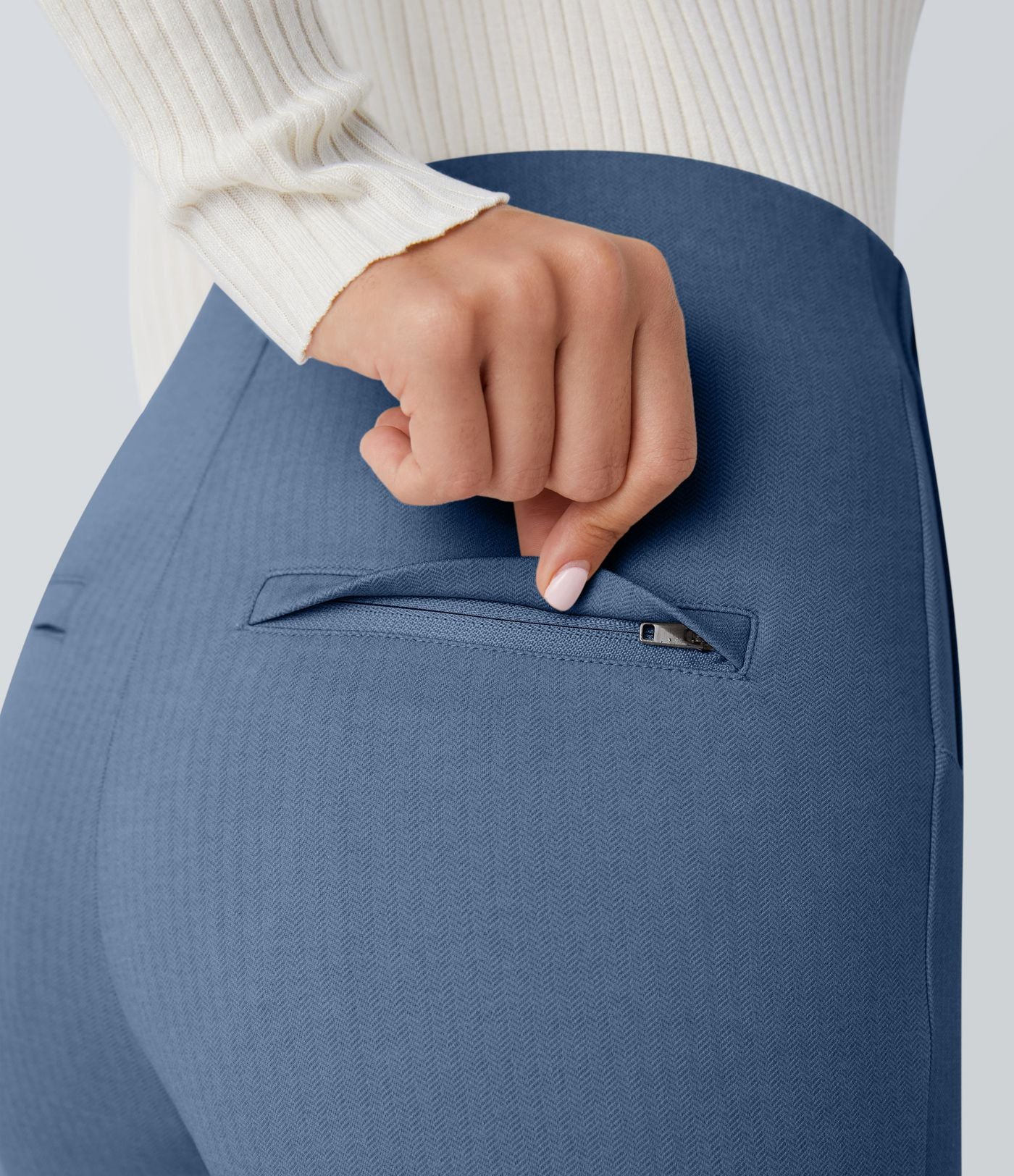 Pantalon tailleur skinny gainant taille haute à chevrons avec poches arrière zippées décoratives