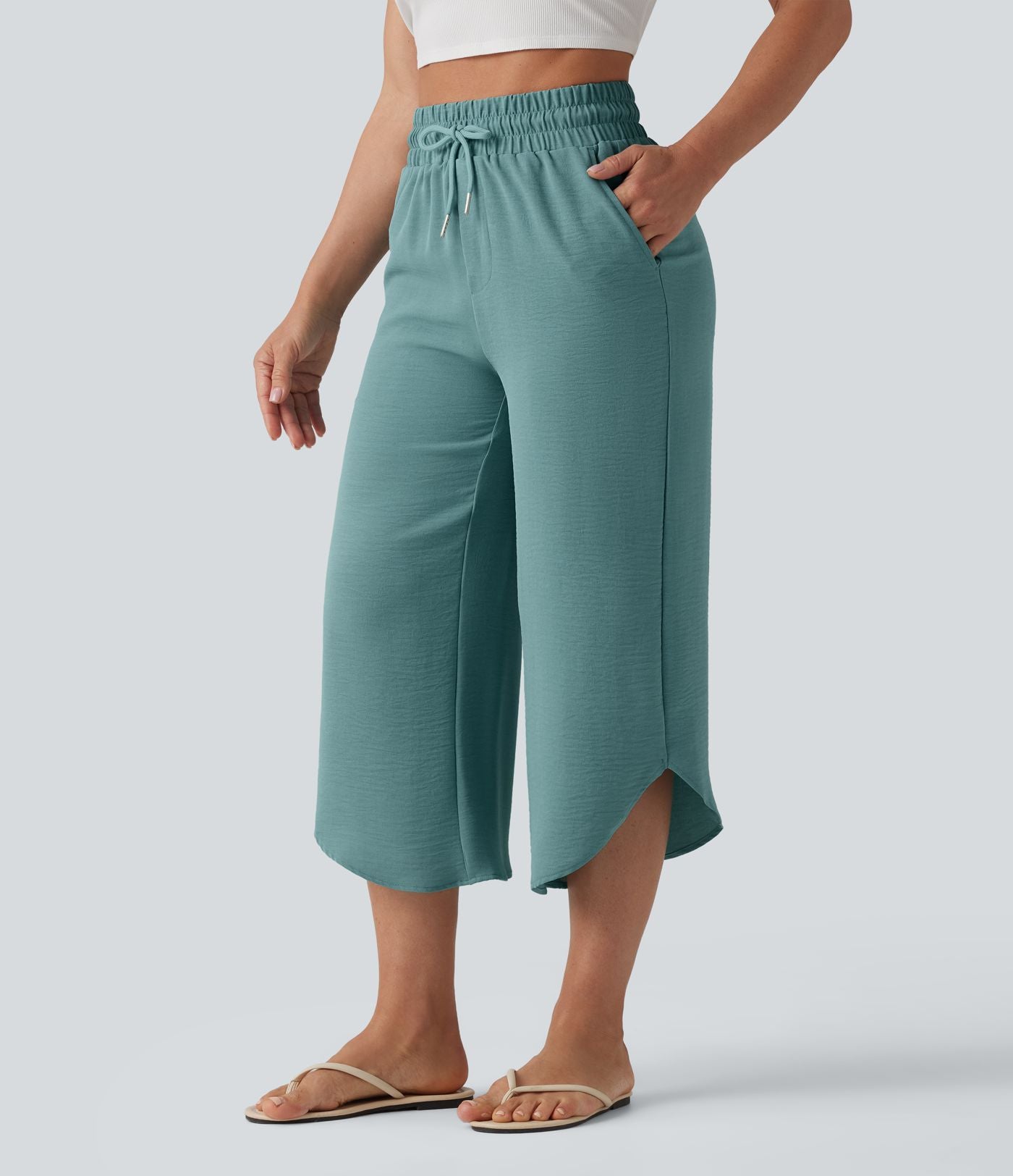 Pantalon casual 7/8 taille haute aspect lin à cordon de serrage et ourlet arrondi avec poches