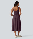 Robe midi fluide sans manches dos croisé, avec brassière intégrée (Bonnets E-G) et poches