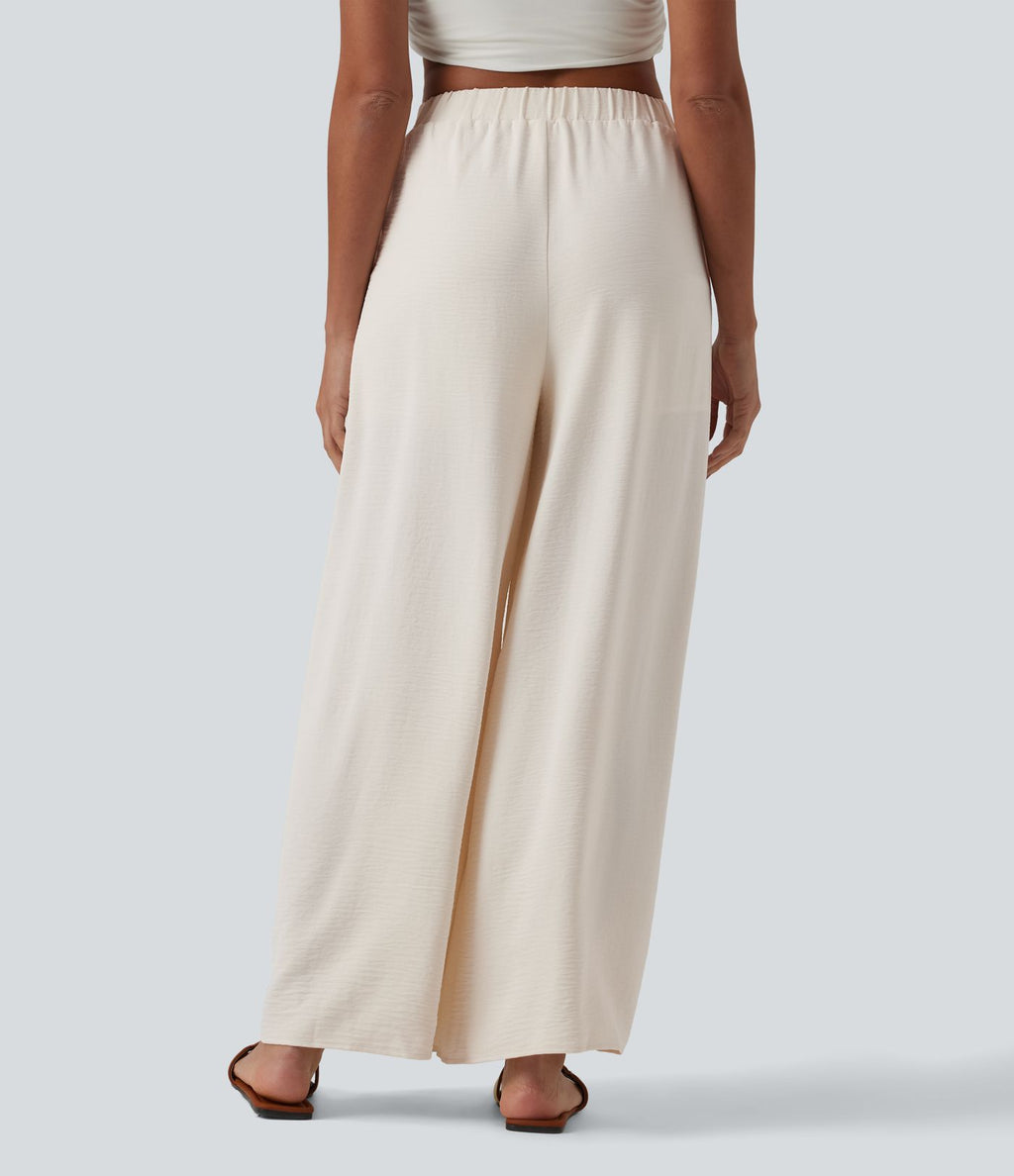 Pantalon large resort taille haute aspect lin avec nœud frontal et poches - Short intégré