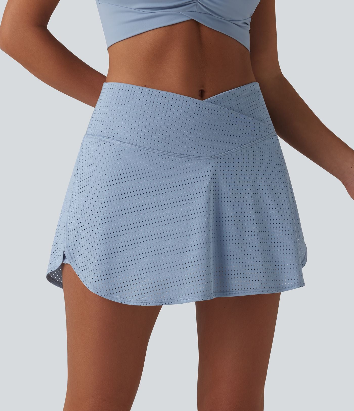 Jupe mini de tennis à œillets, taille haute, 2 en 1, coupe trapèze, croisée, avec poches