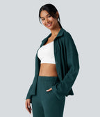 Top détente gaufré col tailleur manches longues boutonnage décontracté