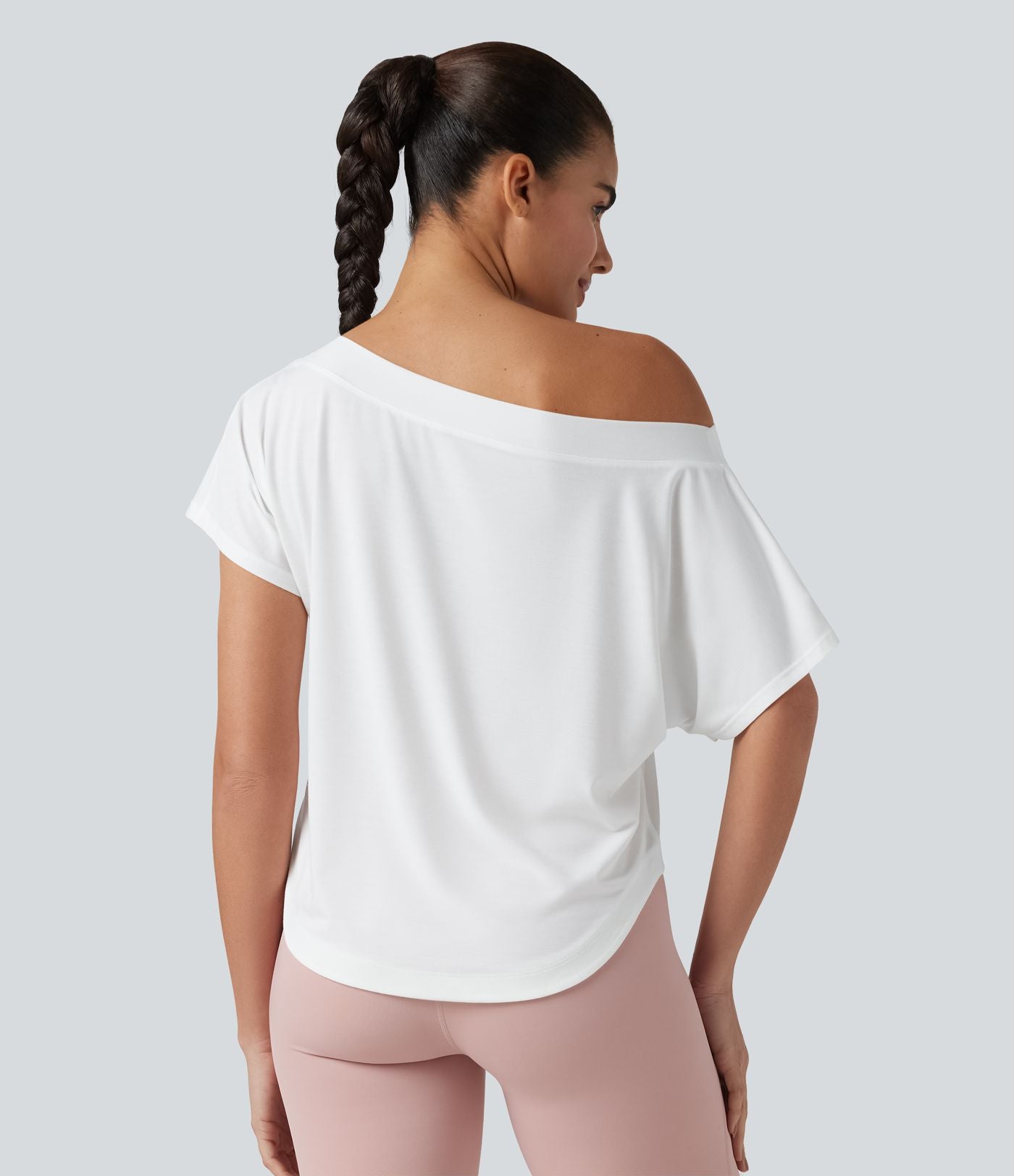 Haut de sport yoga asymétrique à une épaule manches courtes ourlet arrondi asymétrique séchage rapide