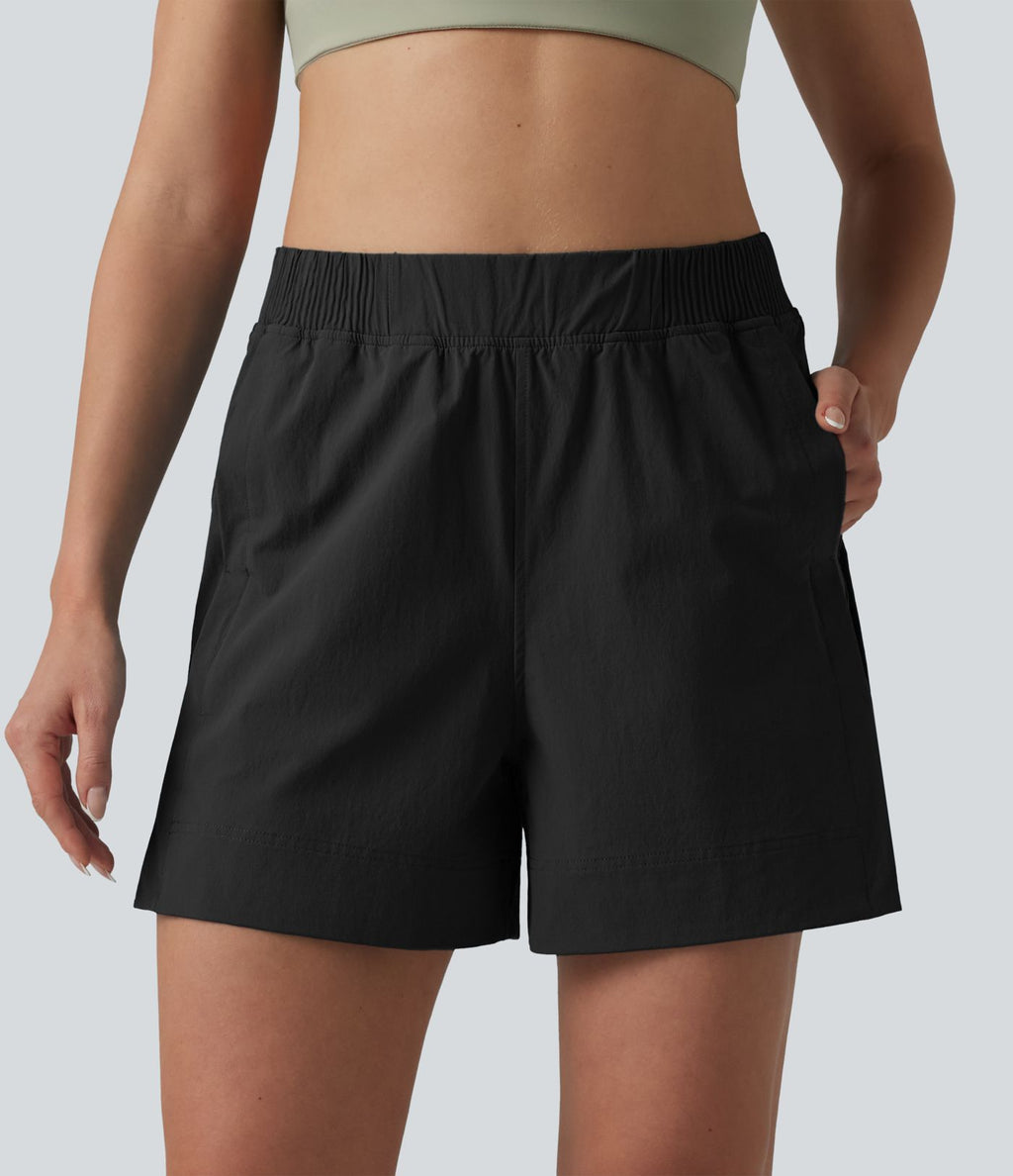 Short de tennis taille haute effet frais InstantCool avec fentes et poches, protection solaire UPF50+