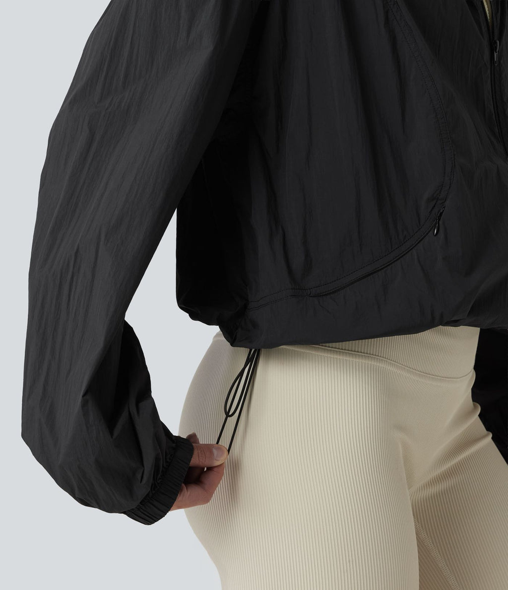 Veste de course légère à capuche manches longues avec poches, cordon de serrage et protection UPF 50+