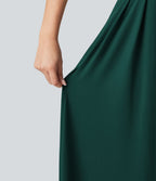 Robe longue fluide décontractée sans manches décolleté en cœur bretelles croisées avec lien dans le dos et poches