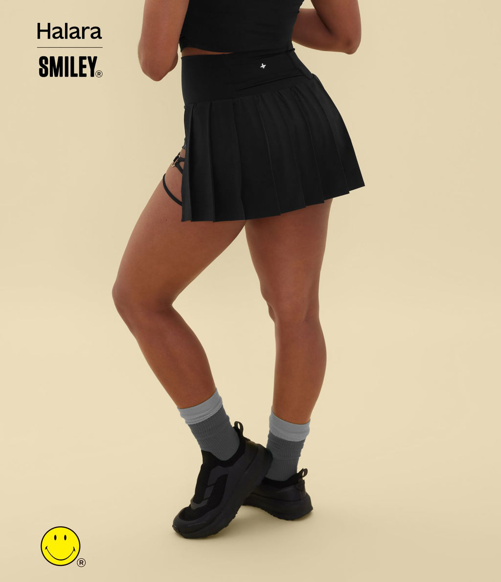 Jupe mini de danse plissée 2-en-1 Halara X Smiley® Breezeful™ taille haute à ourlet asymétrique séchage rapide avec poches