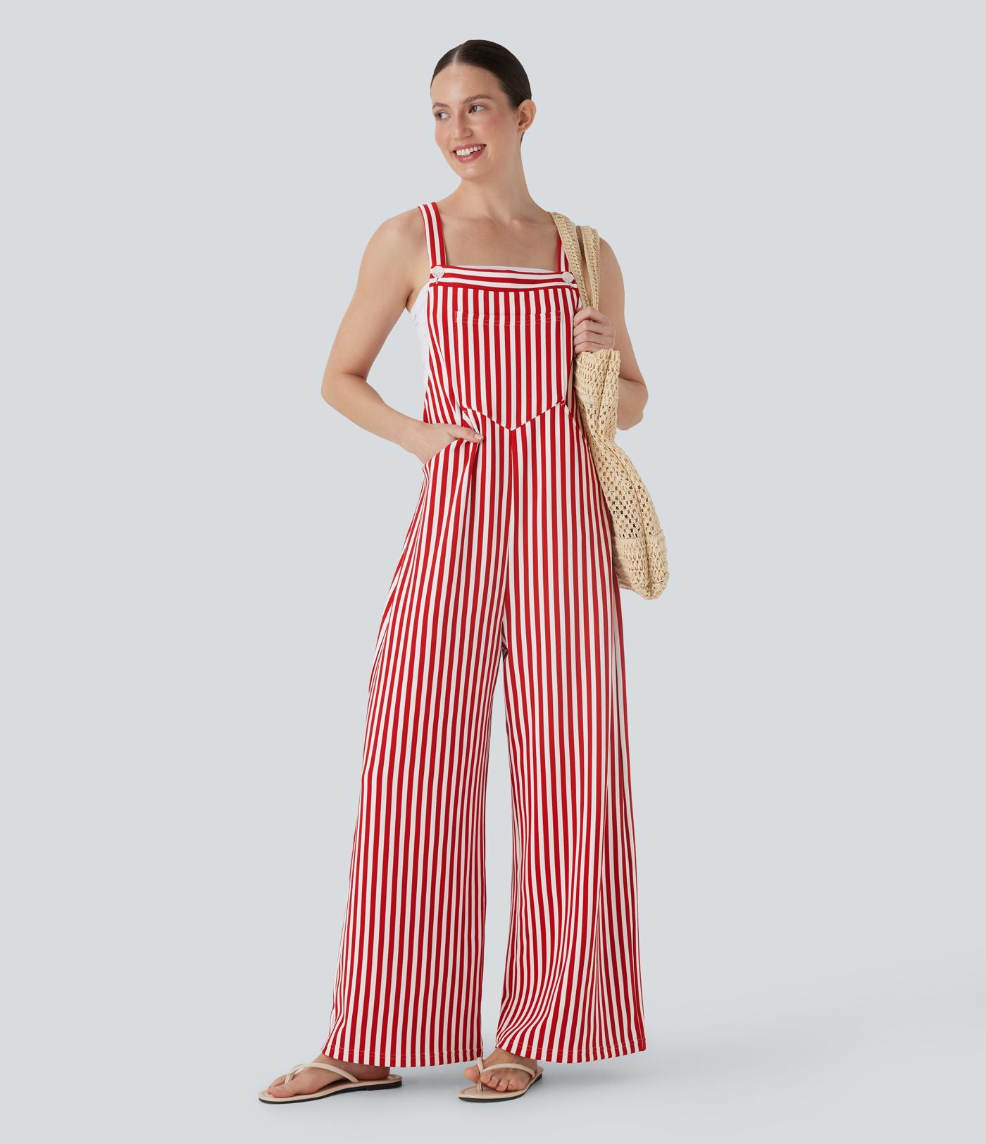 Salopette de resort à bretelles ajustables, boutons, poches multiples et rayures