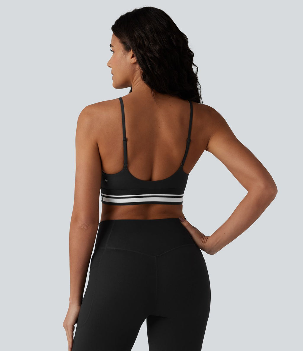 Brassière de sport SoftlyZero™ Plush à maintien léger, dos croisé ouvert, rayures color block et soutien intégré