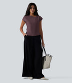 Blouse tailleur asymétrique col drapé manches courtes avec fronces et ourlet fendu
