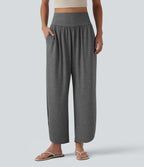 Pantalon décontracté taille haute gainant avec ourlet arrondi et poches