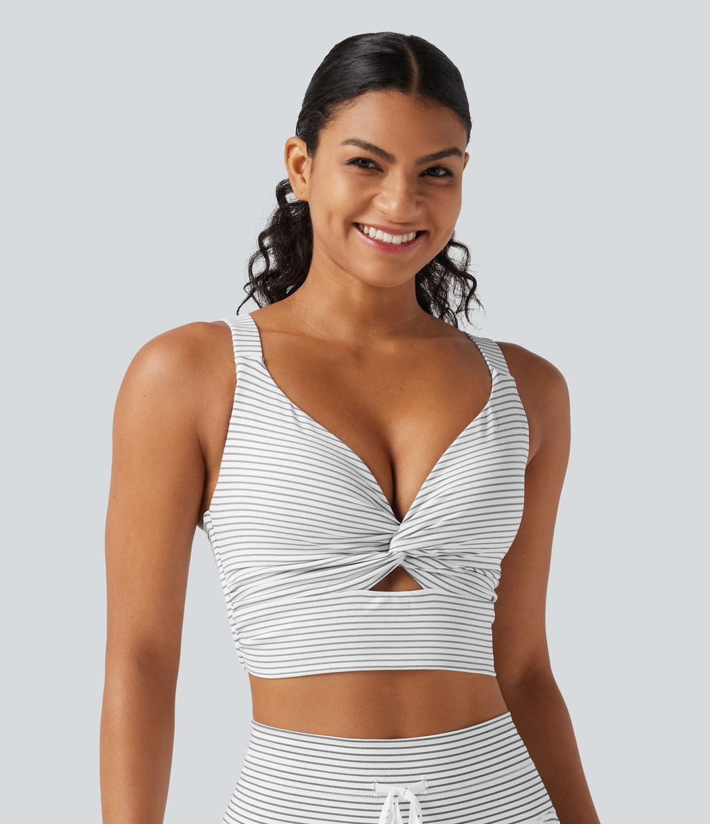 Brassière de sport push-up rayée à maintien léger, avec coussinets fixes, idéale pour le yoga.