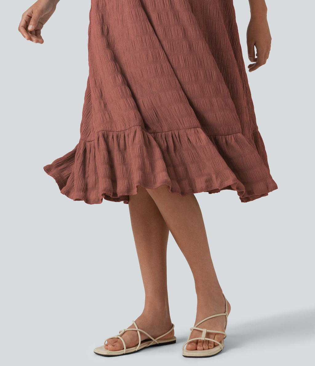 Robe midi sans manches à encolure arrondie avec coussinets amovibles et ourlet à volants