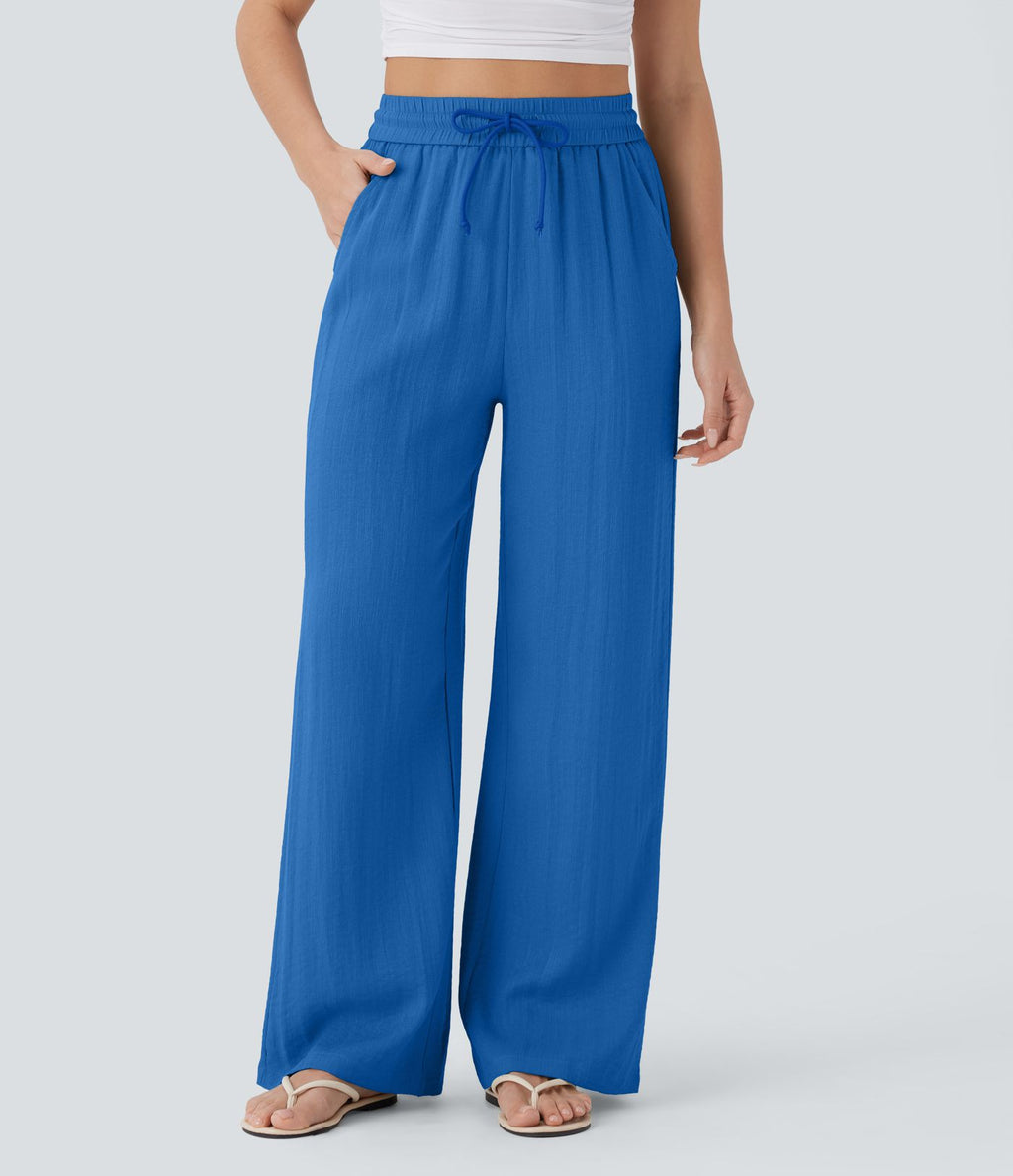 Pantalon large fluide taille haute avec cordon de serrage, poches latérales et aspect lin