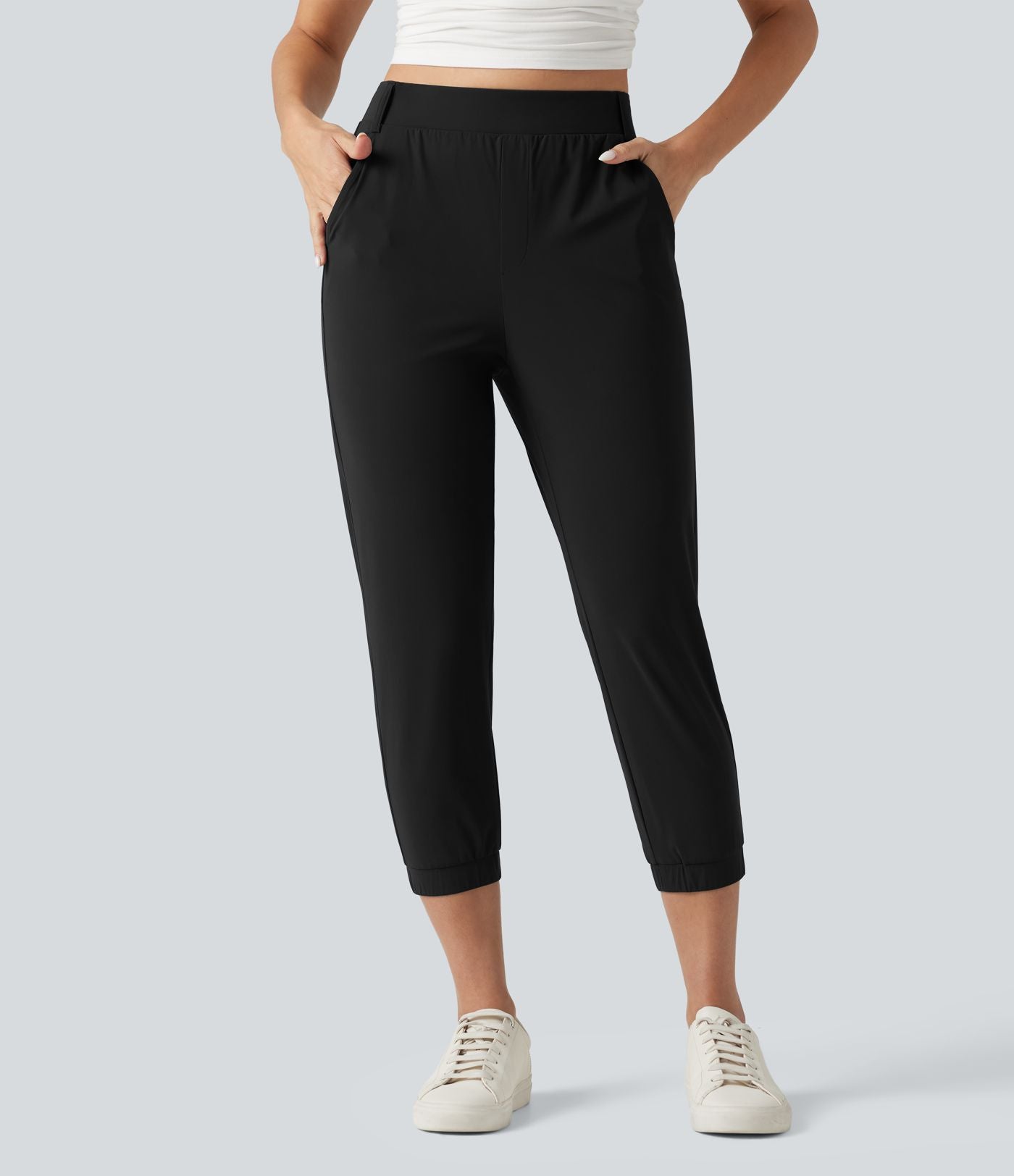 Jogging court taille haute à séchage rapide pour le golf avec poches