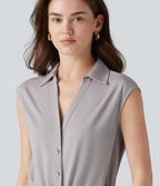 Chemise tailleur sans manches col V avec braguette boutonnée et cordon