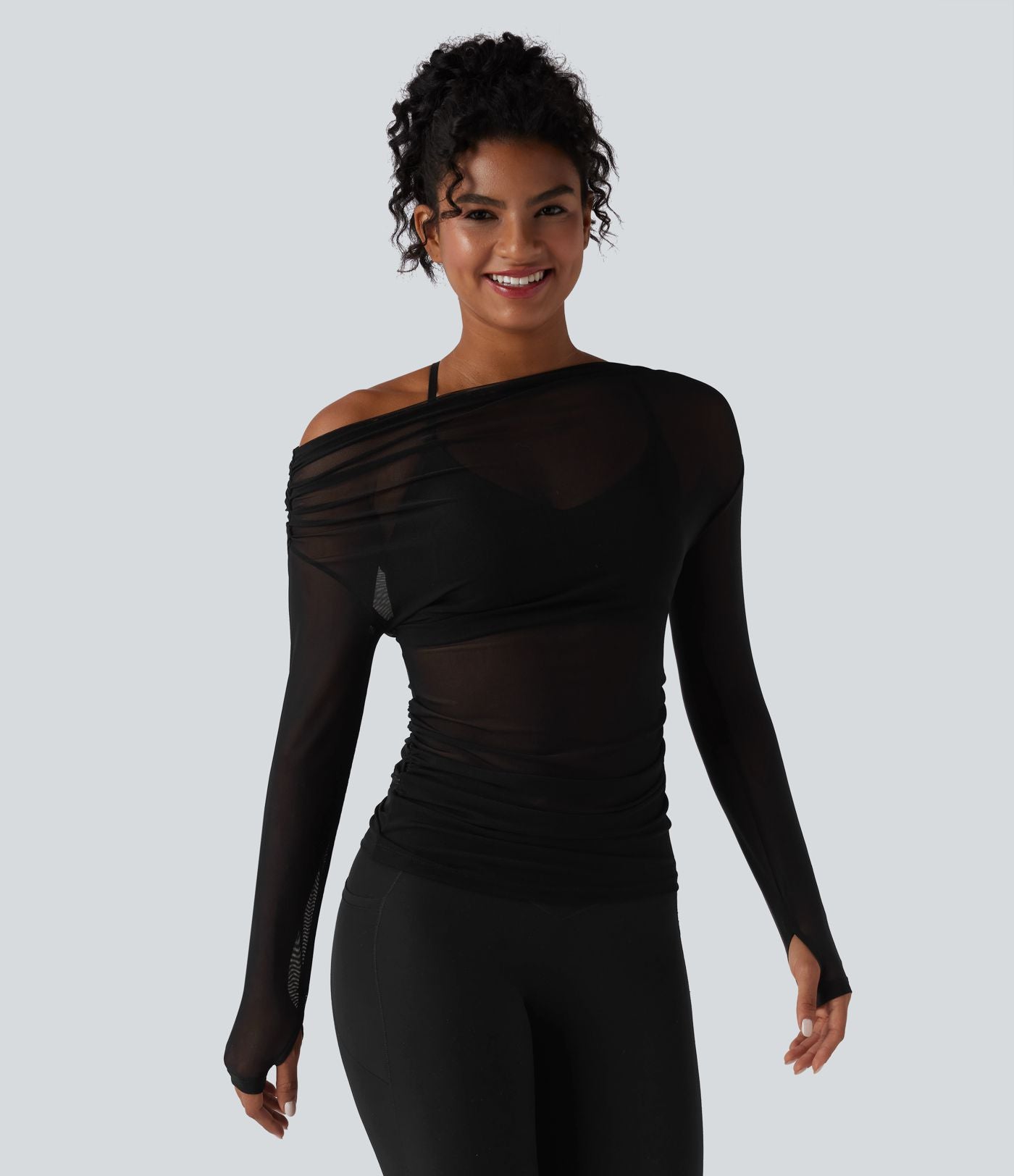 Haut de yoga asymétrique manches longues mesh avec ouverture pouce