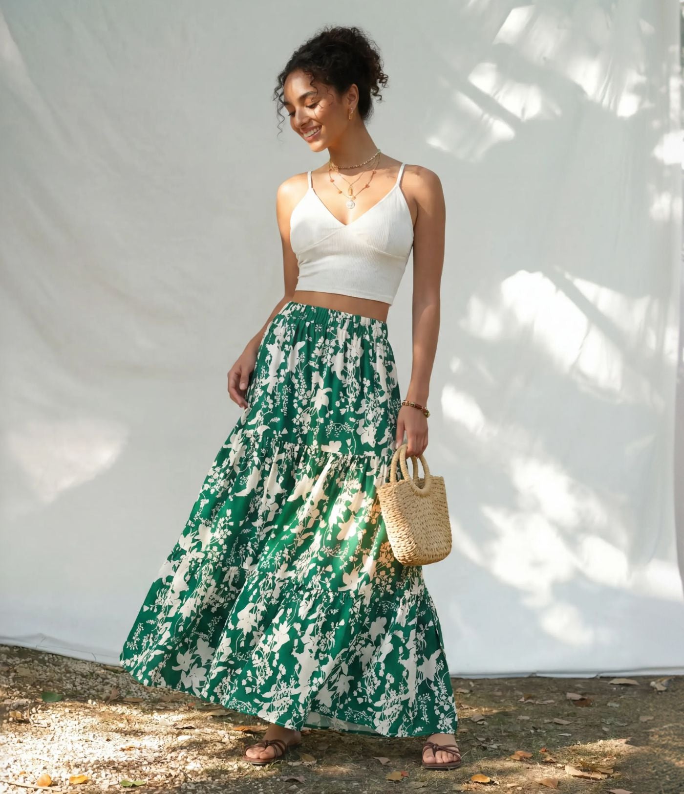 Jupe longue fluide taille haute à volants superposés imprimé floral pour les vacances