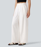 Pantalon tailleur large, taille moyenne, à poches
