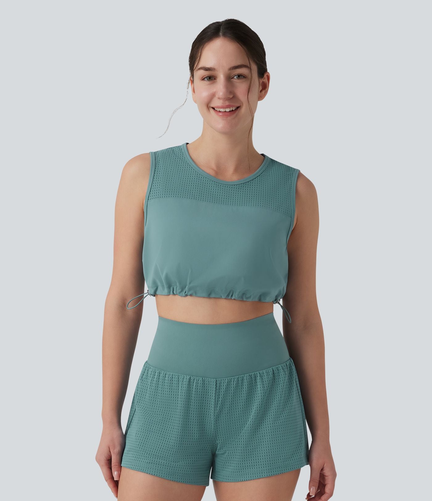 Débardeur yoga court col rond mesh respirant avec ourlet à cordon de serrage