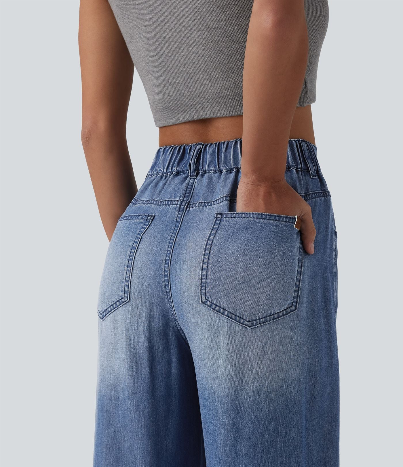Jean large décontracté asymétrique en lyocell taille mi-haute drapé avec poches