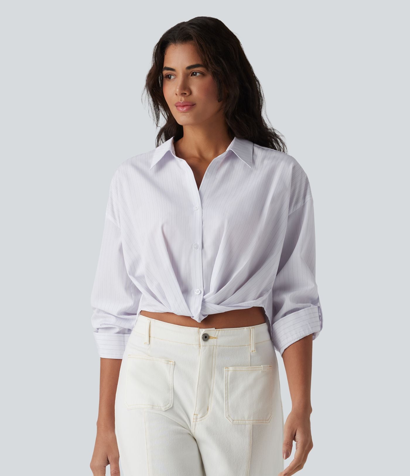 Chemise casual col manches retroussées torsadée asymétrique à rayures