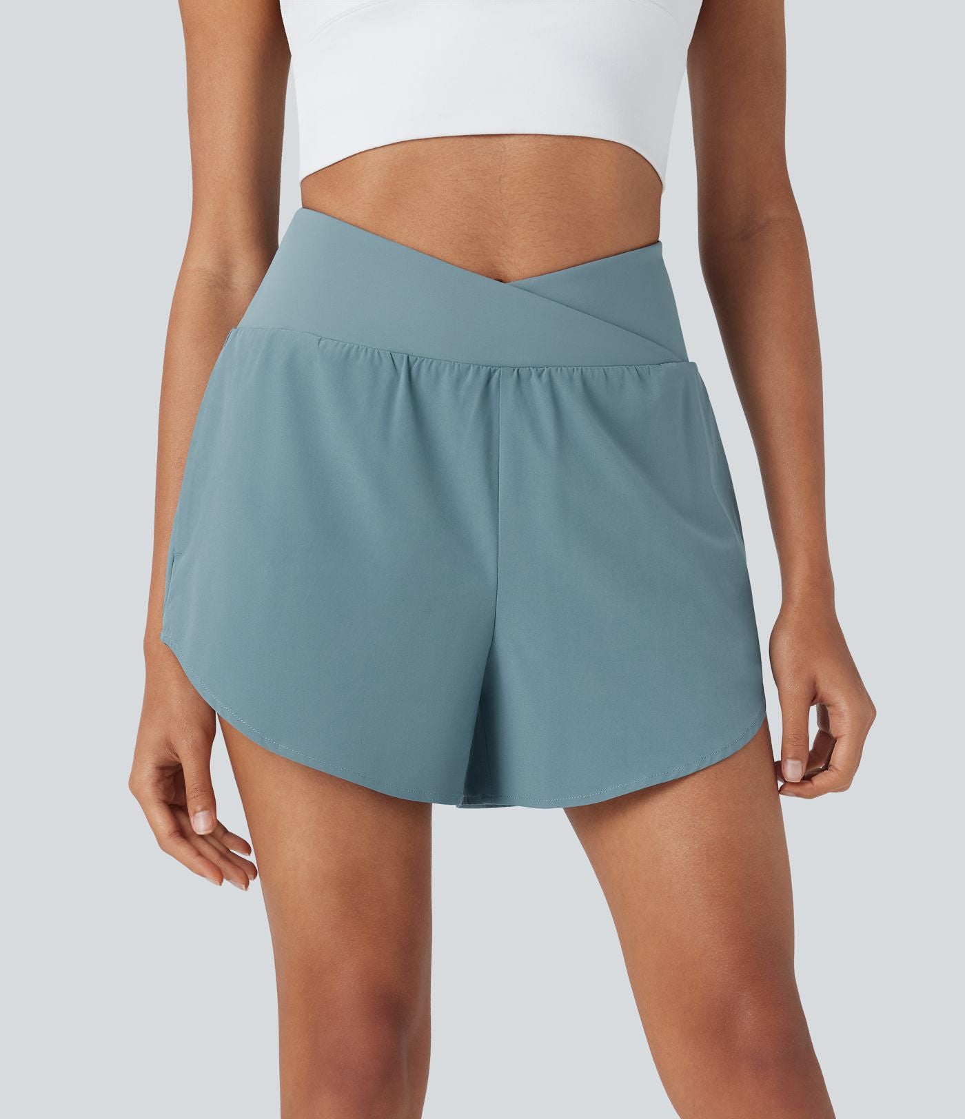 Short yoga 2-en-1 Breezeful™ taille haute croisé séchage rapide avec poches multiples