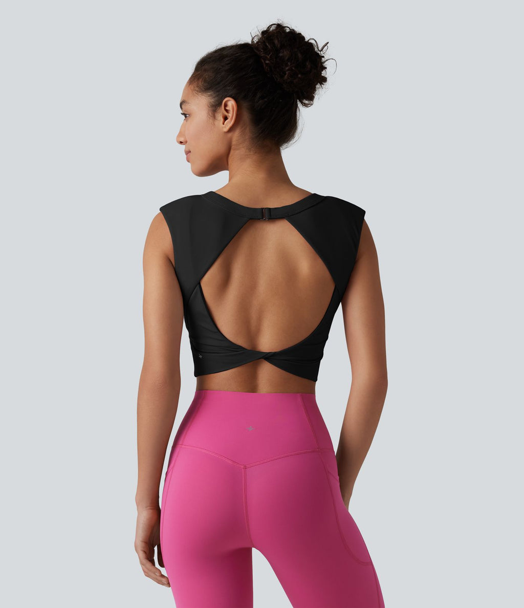 Haut de yoga court SoftlyZero™ léger à col rond et soutien-gorge intégré, sans manches et respirant.