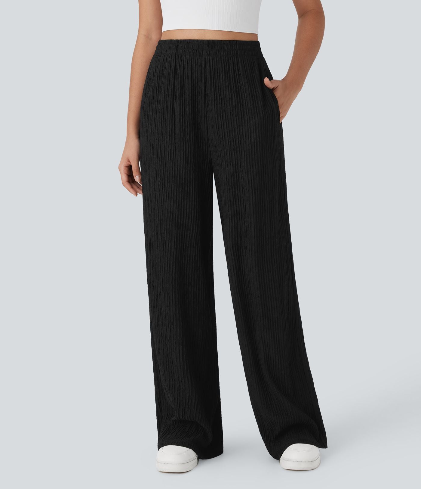 Pantalon tailleur décontracté à taille haute, jambes droites, texture froissée et poches latérales