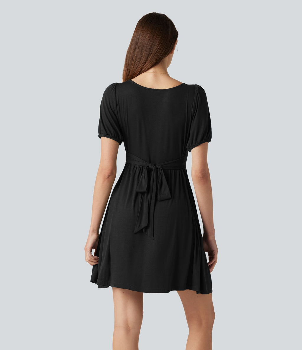 Robe décontractée mini col rond échancré manches courtes dos noué avec poches
