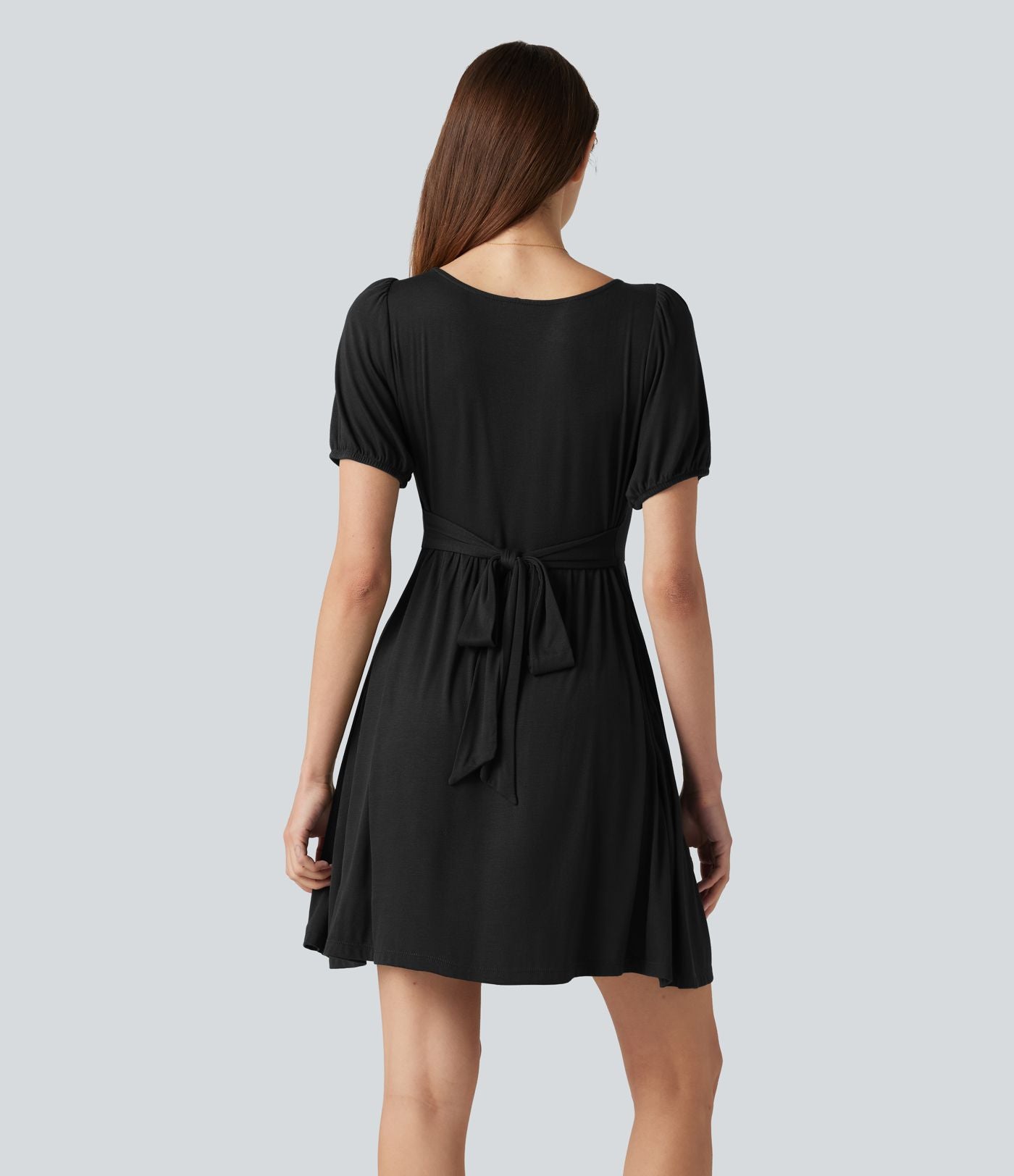 Robe décontractée mini col rond échancré manches courtes dos noué avec poches