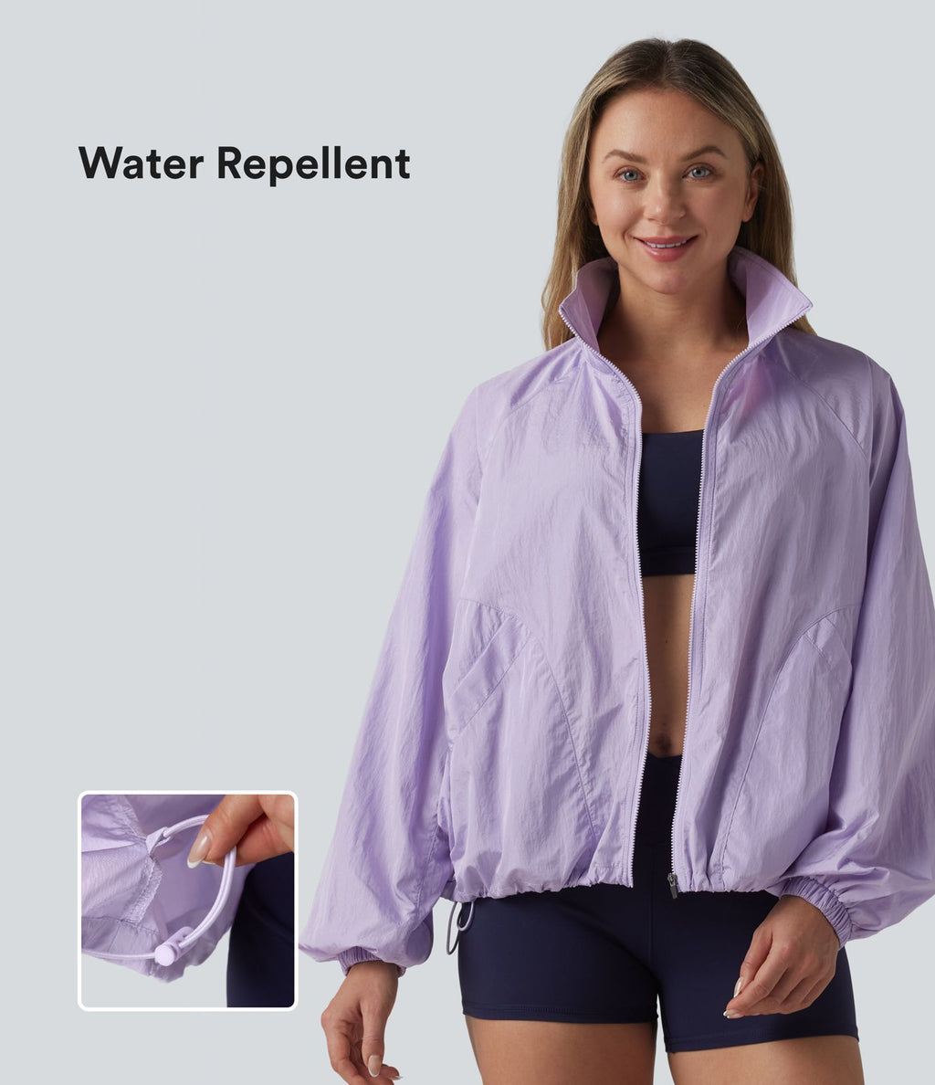 Veste de sport déperlante col montant manches longues zippée avec poches