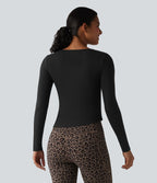 Halara HeatCore Haut de sport chauffant col rond manches longues ourlet asymétrique