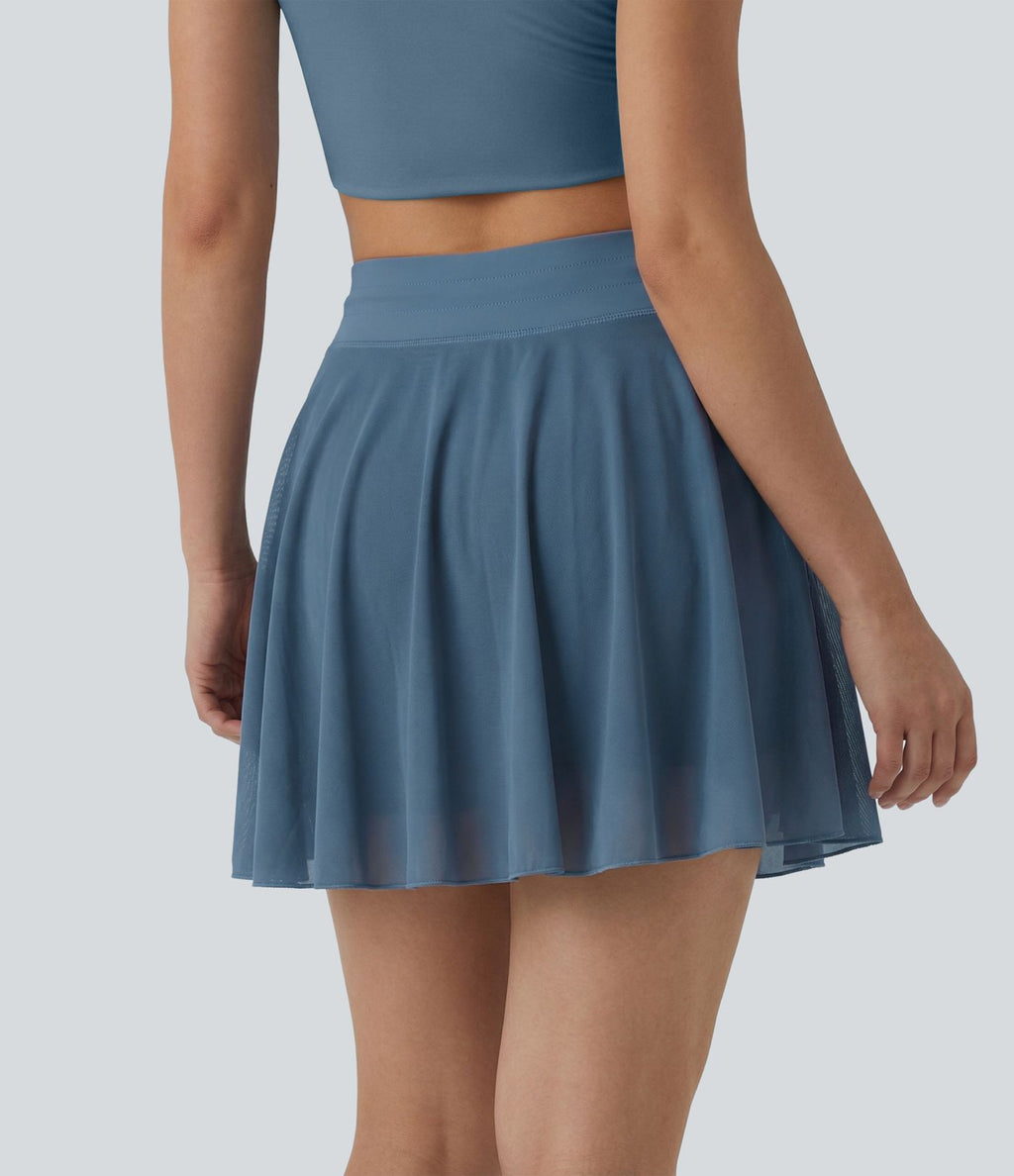 Jupe mini fluide évasée 2-en-1 taille haute à cordon, empiècements en mesh contrastant, avec poche, version plus longue