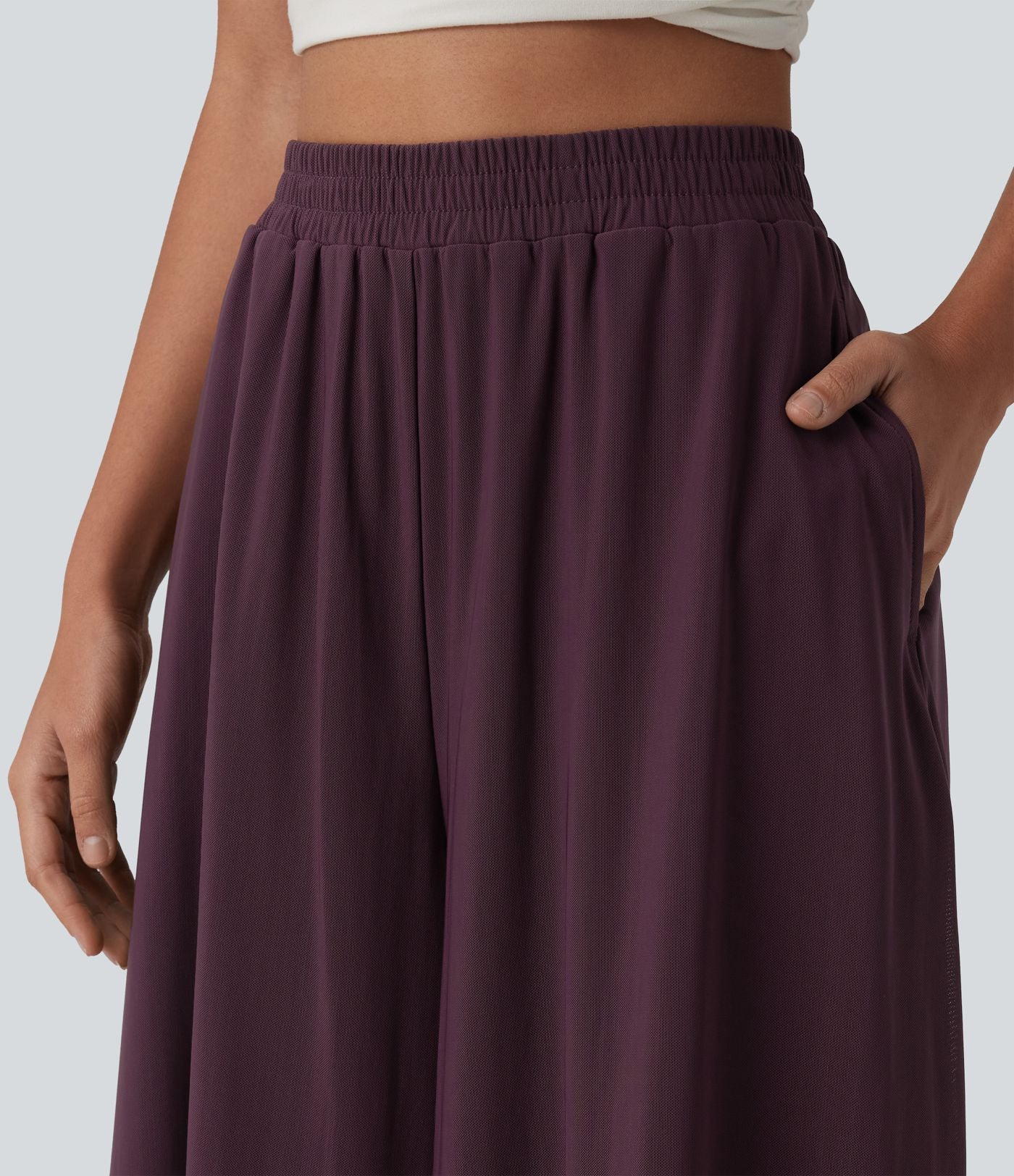 Pantalon fluide et ample avec superposition en mesh, poches latérales et taille haute