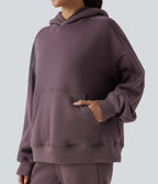 Sweat-shirt de sport casual oversize en molleton à capuche et manches longues avec poches