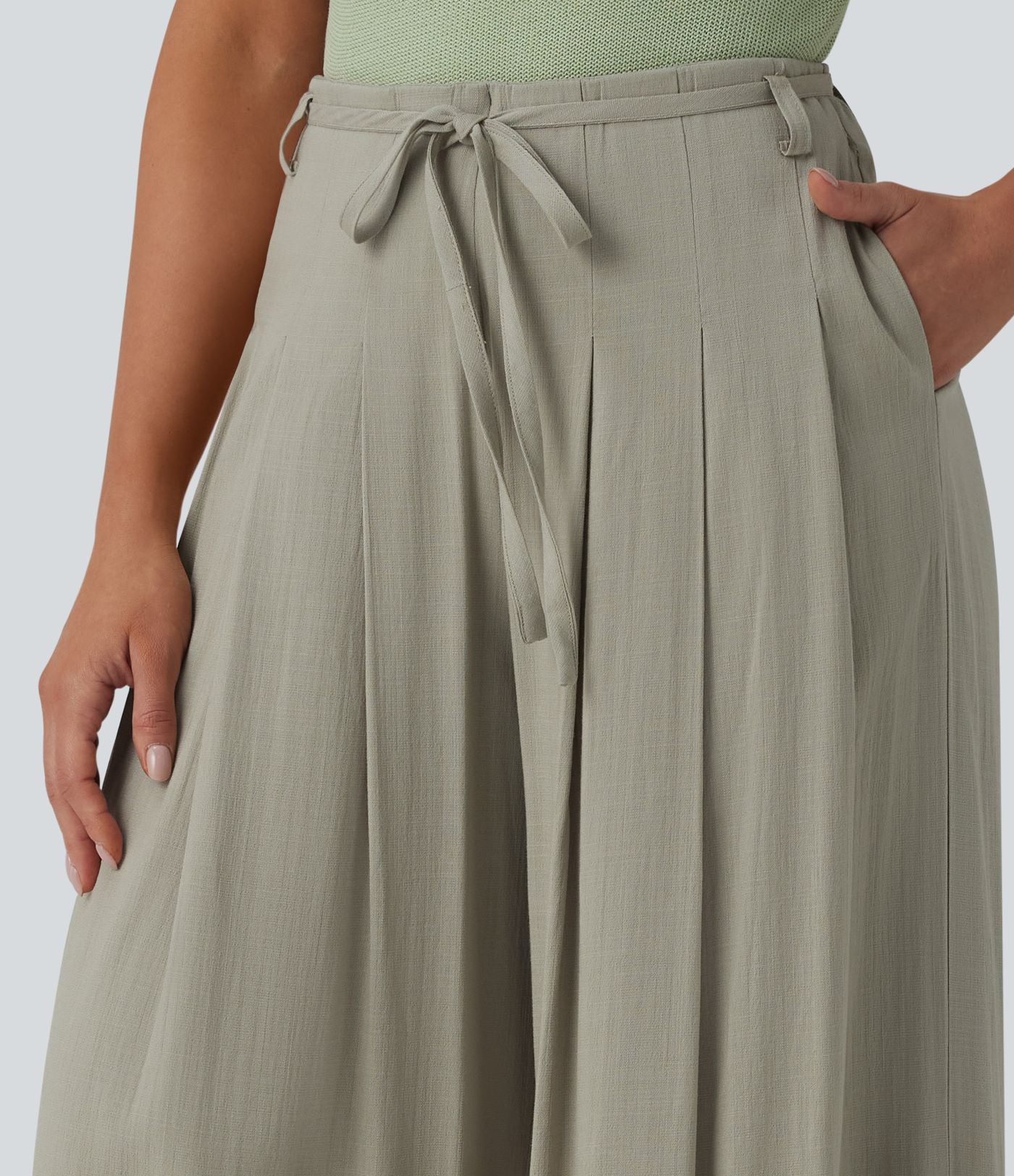 Pantalon large fluide taille mi-haute aspect lin avec ceinture et poches