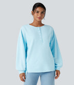 Sweat-shirt gaufré henley oversize manches longues avec poches