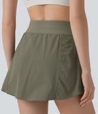 Jupe de sport mini 2-en-1 taille haute coupe trapèze avec cordon de serrage et poches