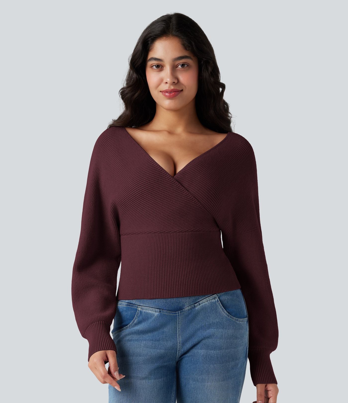 Pull col V manches chauve-souris longues à découpes