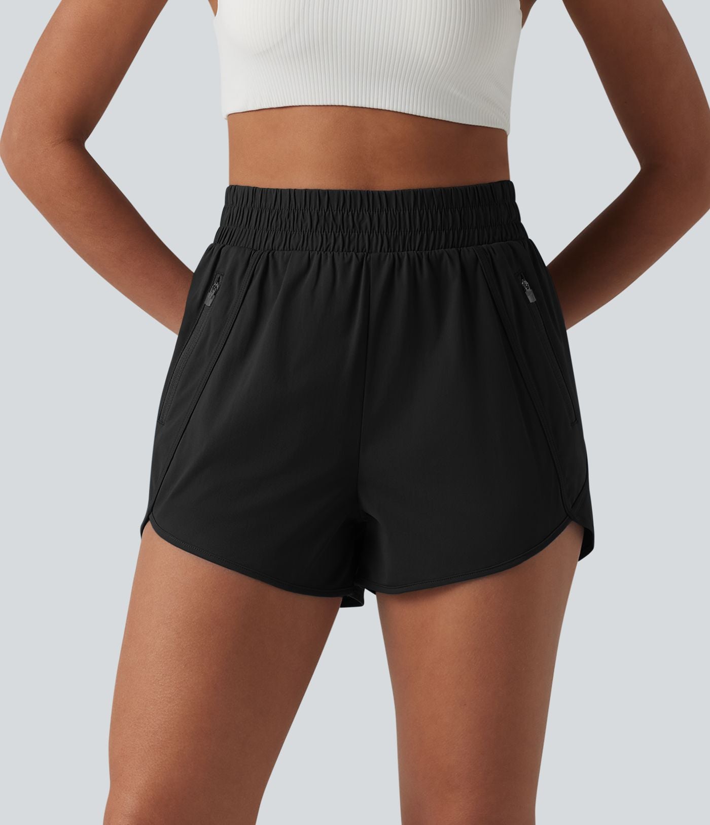 Short de yoga 7,5 cm taille haute à ourlet arrondi et poches